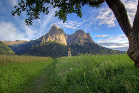 Evening view of the Seis schlern and Church of St. Valentineの写真素材
