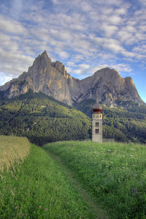 Evening view of the Seis schlern and Church of St. Valentineの写真素材