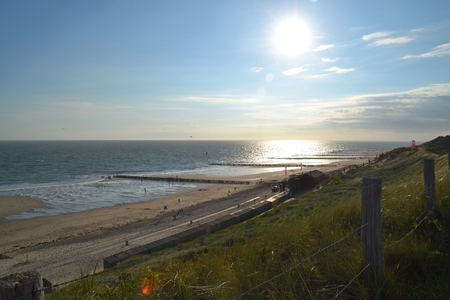 View from the dunes to the coast and the seaの写真素材
