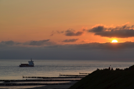 A ship in the light of the sunsetの写真素材
