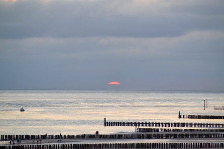End of a sunset on the coastの写真素材