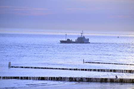 Colorful picture of the North Sea with a shipの写真素材