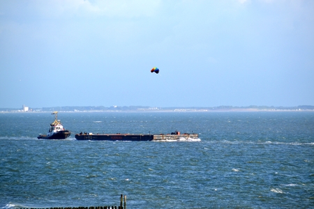 Push-ship on the North Sea in front of Zoutelandeの写真素材