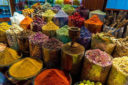 Colorful different spices in the spice market souk in old Dubai rusticの写真素材