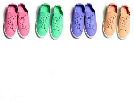 4 colorful woman sneaker shoes on white backgroundの写真素材
