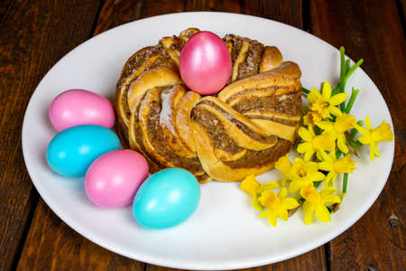 Easter baking. Easter wreath. A wreath with an easter egg in the middleの写真素材