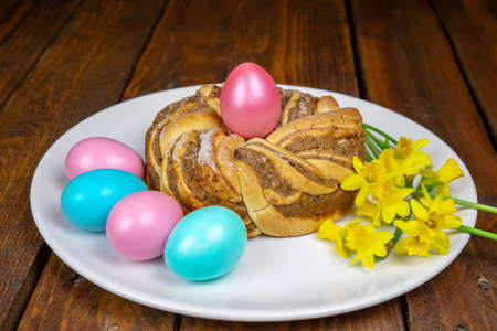Easter baking. Easter wreath. A wreath with an easter egg in the middleの写真素材