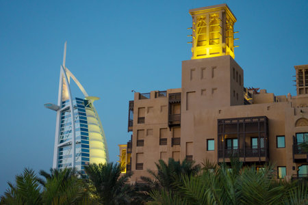 Dubai,UAE 11. 03. 2018 : burj al arab in souk madinat jumeirah background with arabic architecture...