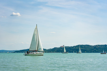 sail boat on the lake Balaton view of Tihany church from Balatonfüred