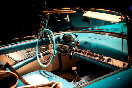Drivers cockpit of a classic blue carの写真素材