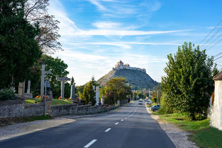 Sumeg castle at the end of the road on a hill in Hungary .の写真素材