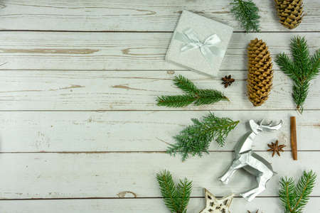 flat lay christmas composition on white wooden background natural with silver details .の写真素材