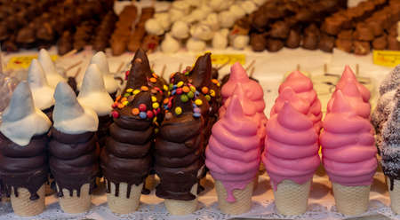 traditional austrian winter ice cream schokokusse im waffel sweet treat candy in the austrian christmas market in Viennaの写真素材