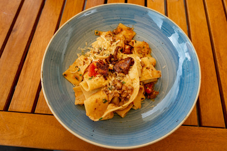 wild forest mushroom with homemade pasta and pecorino cheese .