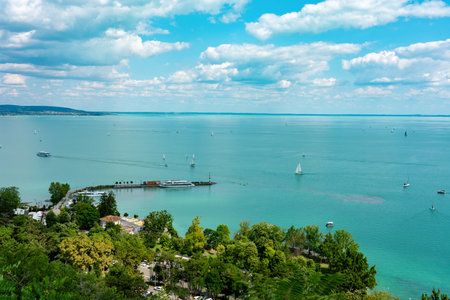 sailing on the lake Balaton with tihany pier view from aboveの写真素材