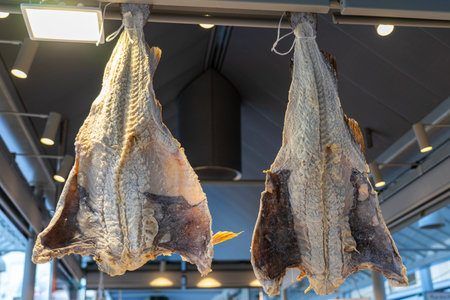 traditional bacalhau salted codfish hanging in a market in Porto Portugal