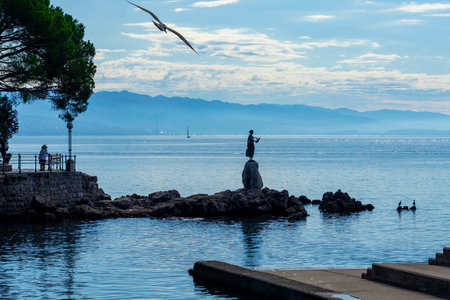 Opatija lungomare promenade with the Maiden with the Seagull statueの写真素材