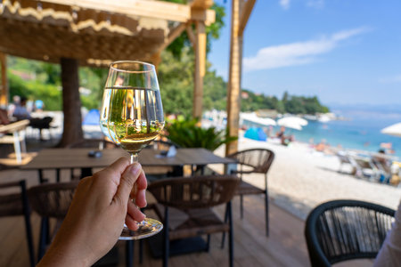 drinking wine on the beach with seaview in Croatia Medvejaの写真素材