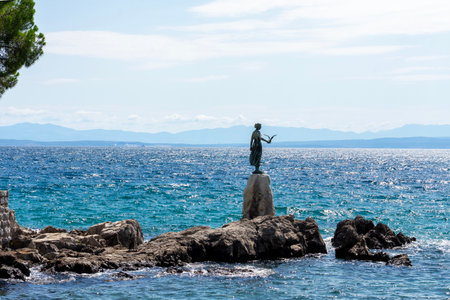 Opatija lungomare promenade with the Maiden with the Seagull statueの写真素材