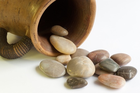 Pebbles spilling from a Jugの写真素材