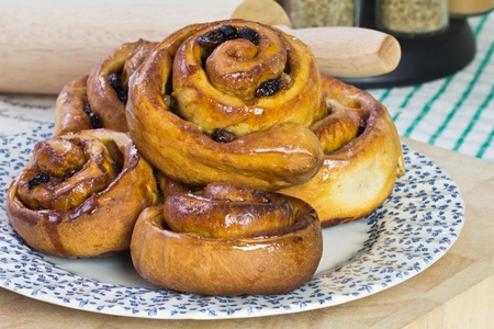 A plate of freshly baked Chelsea Bunsの写真素材