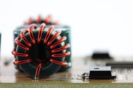 macro detail of inductor with red wireの写真素材