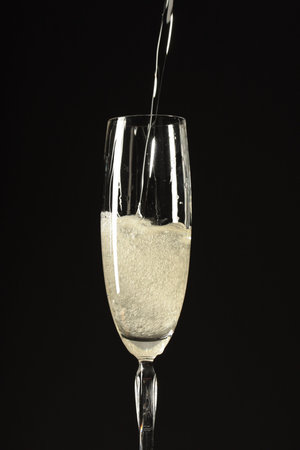 glass of champagne on black backgroundの写真素材