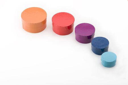 colored round boxes on white backgroundの写真素材