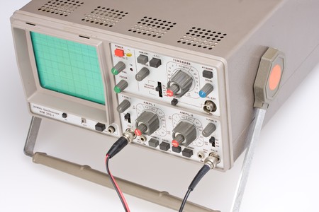 analogue oscilloscope on grey backgroundの写真素材