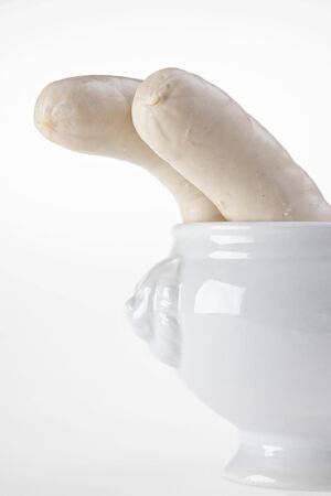 bavarian white sausage, wheat beer and pretzelの写真素材