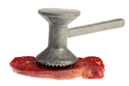 raw steak prepared for cooking isolated on white