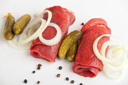 rolled raw veal cutlets and assorted ingredientsの写真素材