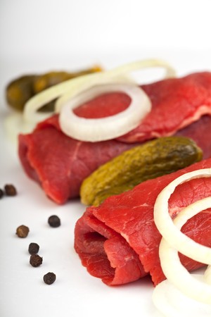 rolled raw veal cutlets and assorted ingredientsの写真素材