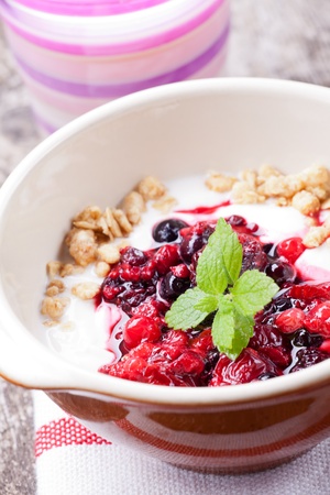 closeup of breakfast cereals with fruits and yoghurtの写真素材