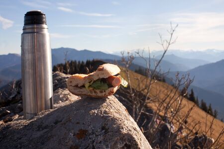 picnic on a mountain summit の写真素材