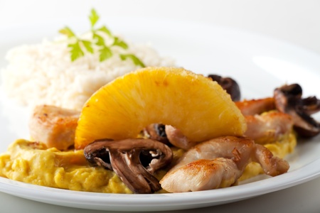 chicken curry with pineapple and rice の写真素材