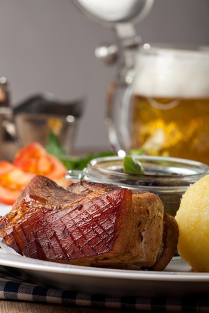 bavarian roast pork dish with dumplings の写真素材