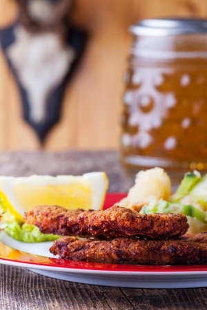 wiener schnitzel and potato salad の写真素材