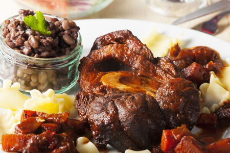italian osso bucco with pasta の写真素材
