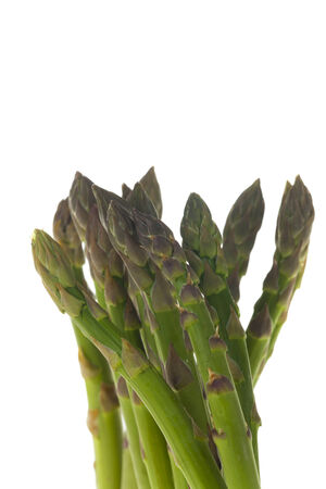 raw green asparagus on white の写真素材