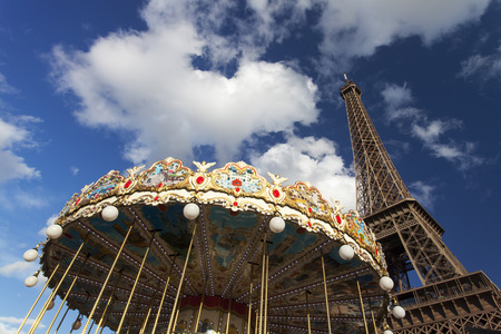 eiffel tower and a carousel の写真素材
