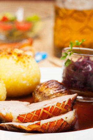 bavarian roasted pork on a plateの写真素材