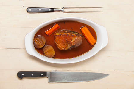 bavarian pork meat in a baking dishの写真素材