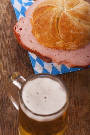 bavarian meatloaf in a bun with beerの写真素材