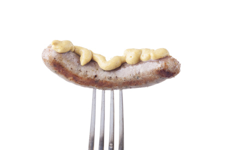 nuremberger sausage on a silver fork の写真素材