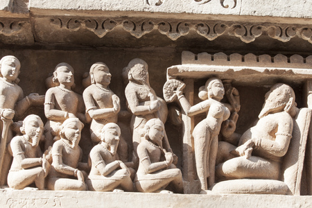stone carvings in khajuraho india の写真素材