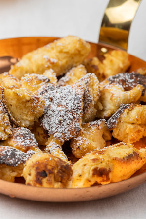 austrian kaiserschmarrn on dark wood