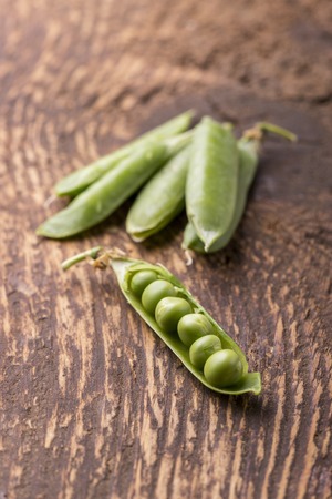 closeup of an open raw peaの写真素材