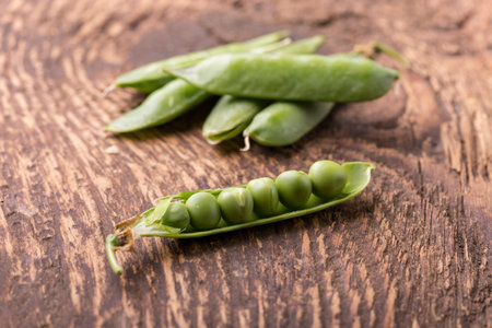 closeup of an open raw pea