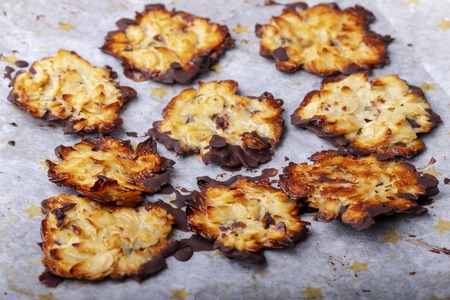 home made florentiner cookies on baking paperの写真素材